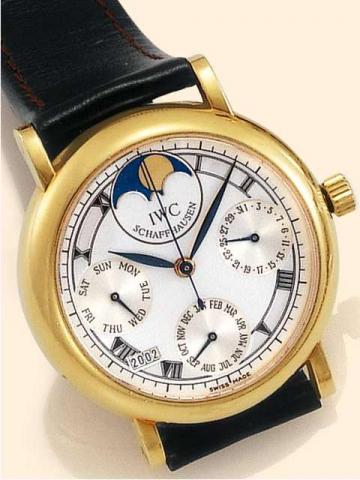 International Watch Co., Schaffhausen, Portofino Perpetuel, Ref. 3541. Produced in the 1990's..Fine, astronomic, center-seconds, self-winding, water-resistant, 18K yellow gold gentleman's wristwatch with perpetual calendar, moon phases and an 18K yellow g
