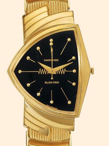 Hamilton Electric, Ventura, No. SO 50734. Production of this model started in 1957.Fine and unusual center-seconds, triangular asymmetrical, 14K yellow gold gentleman's wrist-watch with electrically-driven balance and a 14K yellow gold fluted link bracele