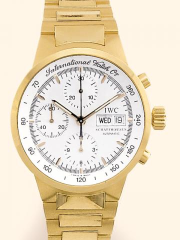 International Watch Co., Schaffhausen, GST Chrono Automatic, Ref. 9277. Produced in the late 1990's.Fine, self-winding, water-resistant to 120m, 18K yellow gold gentleman's wristwatch with double date, round-button chronograph, registers, tachometer and a