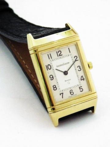 Jaeger LeCoultre Reverso, Ref. 140 007 1. Produced in the 1980's.Fine, rectangular, 18K yellow gold reversible gentleman's wristwatch with a Jaeger LeCoultre buckle.