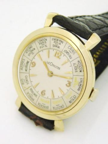 LeCoultre, Ref. 565-144. Produced in the 1950's.Fine, round, 10K yellow gold filled gentleman's wristwatch with world time zone dial.