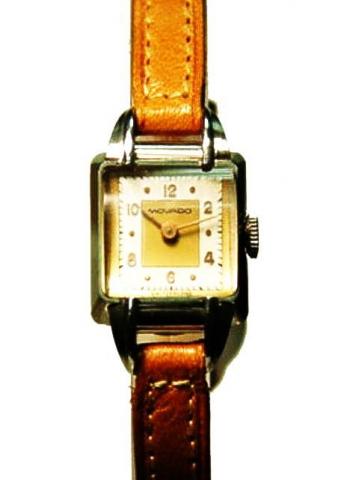 Movado, Ref. 14283. Produced in the 1940's. Fine and small, square, stainless steel lady's wristwatch.