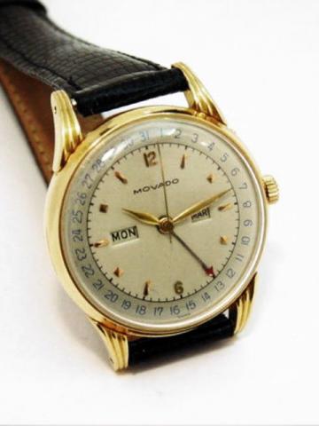 Movado, Ref. 4878. Produced in the 1940's.Fine, round, center-seconds, 18K pink gold gentleman's wristwatch with triple date calendar.