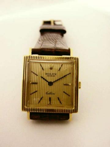 Rolex, Cellini, Ref. 3614. Retailed by Bucherer in 1969. Fine, rectangular, 18K yellow gold gentleman