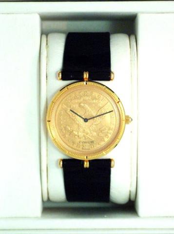 Corum Coin Watch, Ref. 55.477.56. Produced in the 1990's, sold on January 15, 2003. Fine, 18K yellow gold gentleman's wristwatch inserted in a 10$ American gold coin dated 1893, bearing the motto In God We Trust, with an 18K yellow gold Corum buckle..Acco