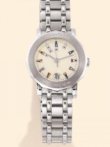 Corum Admiral's Cup, Ref. 39.130.20 V 585. Produced in the 1990's, sold on January 15, 2003.Very fine, dodecagonal, center-seconds, water-resistant, stainless steel lady's quartz wristwatch with date and an 18K brushed stainless steel Corum bracelet decor