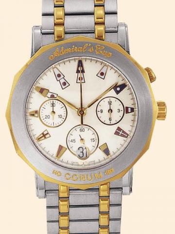 Corum Admiral's Cup, Ref. 96.830.21 V 585. Produced in the 1990's, sold on January 15, 2003.Very fine, water-resistant, dodecagonal 18K yellow gold and stainless steel gentleman's quartz wristwatch with date, round button chronograph and registers, and a 