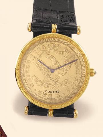 Corum Coin Watch, Ref. 55.477.56. Produced in the 1990's, sold on January 15, 2003.Fine, 18K yellow gold gentleman's wristwatch inserted in a 10 U.S. gold coin dated 1893, bearing the motto In God We Trust, with an 18K yellow gold Corum buckle. Accompanie