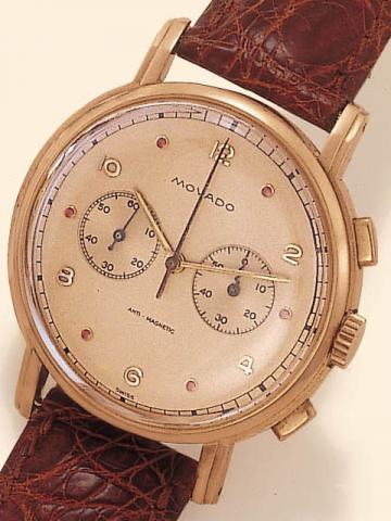 Movado, Anti-Magnetic, Ref. 9033. Produced in the 1950's.Fine, 18K pink gold gentleman's wristwatch with square button chronograph and register.