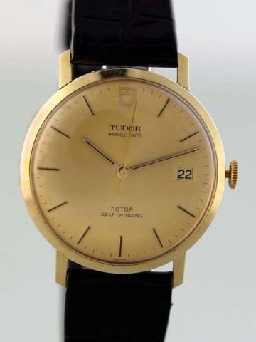 Tudor Prince Date, Rotor Self-winding, Ref. 9850. Produced in the 1980's..Fine, center-seconds, self-winding, 14K yellow gold gentleman's wristwatch with date and a Tudor buckle.