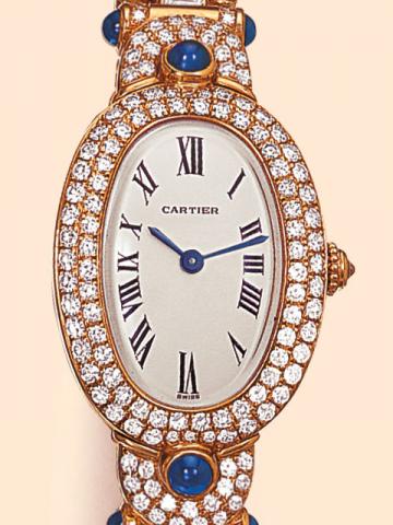 Cartier Baignoire, Ref. 0816. Produced in the 1980s. Extremely fine and precious, oval curved, water-resistant, 18K yellow gold, diamon and cabochon sapphire lady's quartz wristwatch with an 18K yellow gold Cartier link bracelet, each link set with round 
