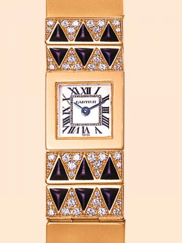Cartier Tank-Lingot, Ref. 1705. Produced in the 1990s. Very fine, square, 18K yellow gold, onyx and diamond lady's quartz wristwatch with an 18K yellow gold articulated Cartier bracelet and 18K pink gold deployant clasp.