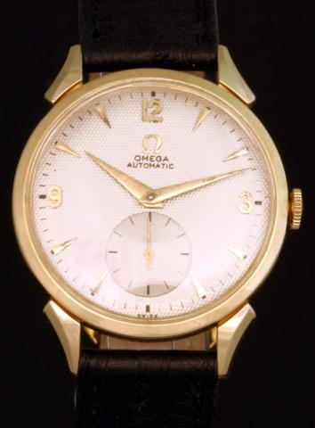 Omega, Automatic, Ref. F 6516. Produced in the 1950's.Fine, self-winding, 14K yellow gold gentleman's wristwatch.