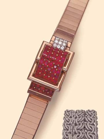 Breguet, Ref. 4166. Produced in the 1950's. Very fine and unusual, rectangular, 18K pink gold, diamonds and rubies, concealed dial lady's wrist- watch with matching 18K pink gold link bracelet.