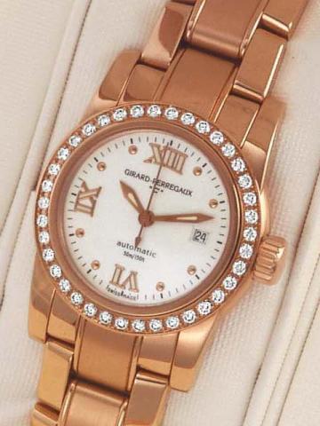 Girard-Perregaux, Lady F, Automatic,Ref. 8039. Produced circa 2000.Fine, center-seconds, self-winding, water-resistant,18K pink gold and diamond lady's wristwatch withdate and an 18K pink gold Girard-Perregaux link bracelet and deploy-antclasp. Accompanie