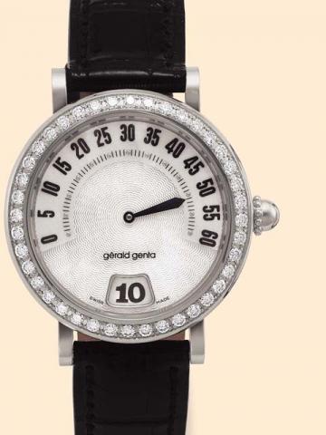 G_rald Genta, R_tro Classic, Ref. G 3614. Pro-ducedin the 1990s.Fine, jump-hour, self-winding, water-resistant, stain-lesssteel and diamonds gentleman