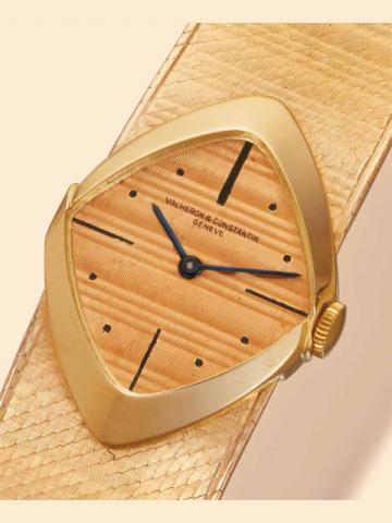 Vacheron & Constantin, Geneve, No. 555688, Ref. 6657, case No. 385296, designed by Ponti Gennari. Made in 1961. Very fine and extremely rare, lozenge-shaped, 18K yellow gold gentleman's wristwatch with a linen textured 18K guilloch_ yellow gold integrated
