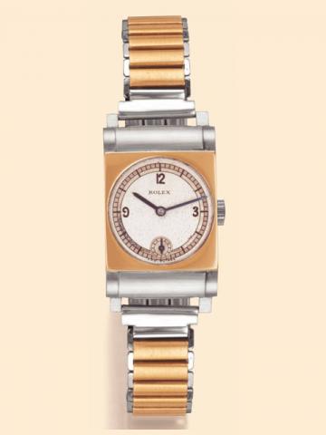 Rolex, Ref. 2535. Produced in the 1930s. Fine, rectangular curved, stainless steel and yellow gold mid-sized gentleman's wristwatch.