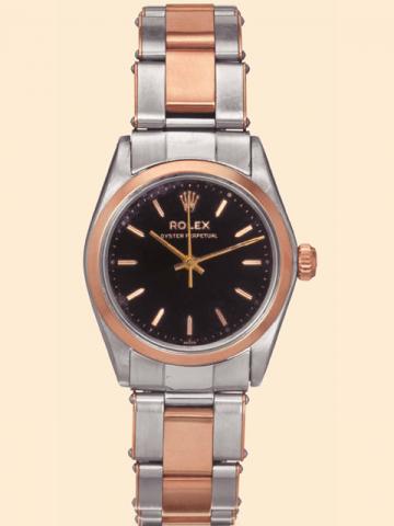 Rolex Oyster Perpetual, Ref. 6151/ 6548. Made in 1966. Fine tonneau-shaped, center-seconds, self-winding, water-resistant, 18K pink gold and stainless steel mid-sized wristwatch with 18K pink gold and stainless steel Oyster bracelet.