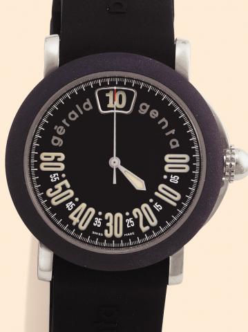 G_rald Genta,Retro Sport, Ref. RSP. L. 10. Produced in the 1990s. Fine, jump hour, center-seconds, self-winding, water-resistant, stainless steel gentleman's wristwatch with retrograde minutes and a stainless steel G_rald Genta buckle. Accompanied by a fi