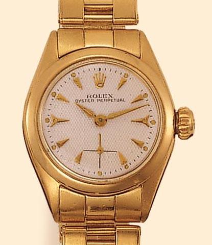 Rolex, Oyster Perpetual, Ref. 6504. Produced in the 1950s. Fine and rare, self-winding, water-resistant, 18K yellow gold lady's wristwatch with an 18K yellow gold Oyster bracelet.