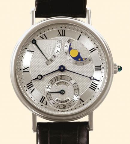 Breguet, No. 4540, Ref. 2849. Produced in the 1990s. Very fine and elegant, astronomic, self-winding, 18K white gold gentleman's wristwatch with 50-hour power reserve, date, phases and age of the moon, and an 18K white gold Breguet buckle.