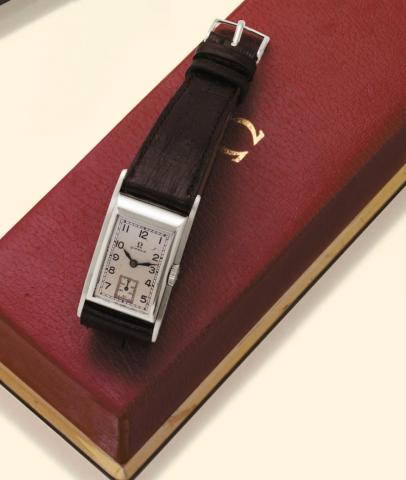 Omega, Ref. CK 3532. Produced in 1937, sold in Sweden. Very fine and extremely rare, rectangular curved, asymmetric, stainless steel Staybrite gentleman's wristwatch. Accompanied by a fitted box.