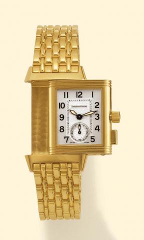 Jaeger-LeCoultre, Reverso Memory, Ref. 255.1.82. Produced in the 1990s. Fine, rectangular, 18K yellow gold gentleman's reversible wristwatch with two dials, permanent minute register and fly-back mechanism, 50 hours autonomy and an 18K yellow gold Jaeger-