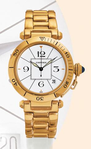 Cartier, Pasha Automatic, Ref. 0585. Made in 1987. Fine center-seconds, self-winding, water-resistant, 18K yellow gold gentleman's wristwatch with date, and a 18K Cartier buckle. Accompanied by a fitted box.