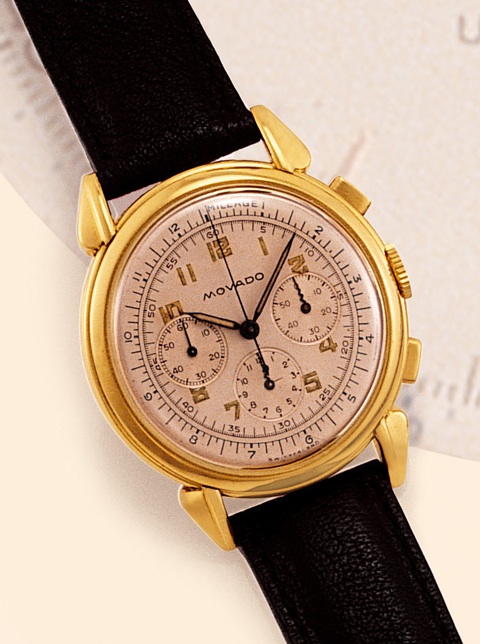 Claw Lugs - Snake Hands Movado, Ref. 9029. Made for the North American market, circa 1950. Very fine, 18K yellow gold gentleman's wristwatch with square button chronograph, registers and tachometer.
