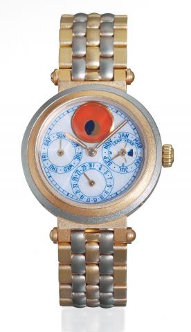 G_rald Genta, Automatic.Ref. G. 3144.7. Produced.in the 1990s..Very fine, astronomic, self-winding.water-resistant, 18K yellow and white.gold gentleman's wristwatch with.perpetual calendar, moon phases and.an 18K yellow and white gold G_rald.Genta bracele