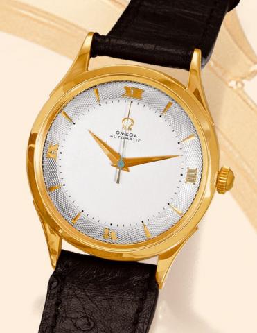 Two-Tone Dial.Omega, Automatic, No. 11875803, case.No. 10903873, Ref. 2584. Made circa.1955..Fine, center seconds, self-winding, water resistant 18K yellow.gold gentleman's wristwatch with a gold plated Omega buckle.