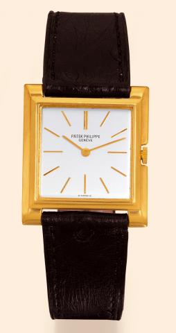 Carr_ Extra-Plat.Patek Philippe & Cie, Geneve, No. 855696.case No. 689874, Ref. 2562. Produced.circa 1955..Very fine and unusual, thin, square, 18K yellow gold gentleman's.wristwatch with an 18K yellow gold Patek Philippe.buckle.