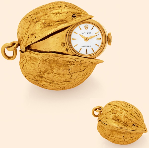 The Walnut.Rolex, Ref. 5482. Made in the 1950s..Fine and unusual, 18K yellow gold watch in.the form of a walnut.