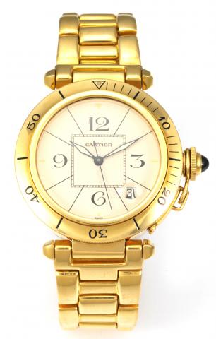 Pasha 38mm.Cartier, Pasha, Automatic, No. 0505, case No. 820907. Made in 1988..Fine, center seconds, self-winding, water-resistant, 18K yellow gold gentleman`s wristwatch with date and an 18K yellow gold Cartier deployant clasp.