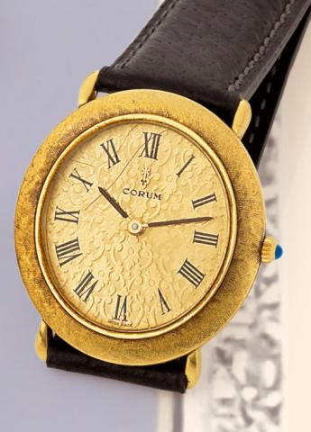 Corum, Ref. 8781. Made in the 1970s..Fine, oval, 18K yellow gentleman's wristwatch.