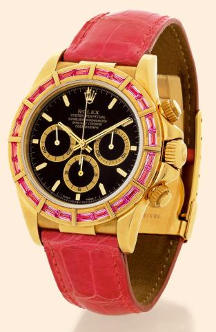 Daytona.Rolex, Oyster Perpetual, Superlative Chronometer, Officially.Certified, Cosmograph, Daytona, Ref. 16588. Sold in 1997..Very fine and rare, self-winding, water-resistant, 18K yellow gold and red sapphires.gentleman's wristwatch with round button ch