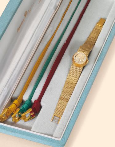 Ref. 2032 Cam_l_on.Rolex, Precision, Cam_l_on, Ref. 2032. Made.in the 1950s..Fine and unusual, 18K yellow gold lady's wristwatch with.assorted yellow, green, red and 18K white and yellow gold.woven sliding straps. Accompanied by a fitted box.
