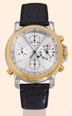 Chrono split Berlin.1907.Ulysse Nardin, Le Locle.Suisse, Chrono split Berlin 1907.No. 022, Ref. No. 575-22. Made circa.1990..Very fine, large, self-winding, waterresistant.to 30 meters, 18K yellow gold.and stainless steel gentleman's wristwatch.with round