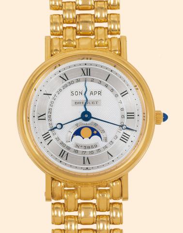 Serpentine.Breguet Serpentine, Ref. 3859B. Made.in the 1990s. Sold in 1991..Very fine, astronomic, self-winding, 18K yellow gold.gentleman's wristwatch with triple date, moon phases.age of the moon and an 18K yellow gold Breguet.bracelet. Accompanied by a