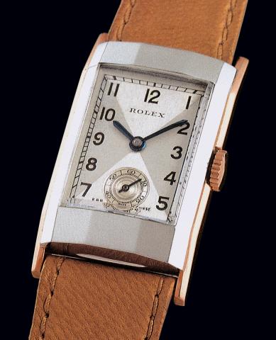 Ref. 2151 Rectangle Facett_.Rolex, Rectangle Facett_, Ref. 2151. Case No. 30425. Made in.1937..Very fine and rare, rectangular, steel and pink gold gentleman's wristwatch.