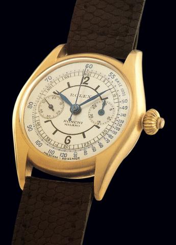 Ref. 2303, Single Button Chronograph.Rolex, Ref. 2303. Case No. 17890. Made in 1935, retailed by.Ronchi Milano..Very fine and extremely rare, small, 18K yellow gold wristwatch with co-axial.button chronograph, registers, tachometer and the original Rolex 