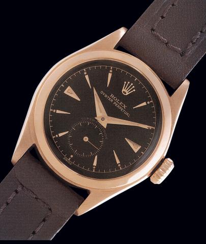 Ref. 6006, Pink Gold Super Precision.Rolex, Oyster Perpetual, Super Precision, with Super.Oyster crown. Ref. 6006. Case No. 927300. Made in 1952..Very fine and extremely rare, tonneau-shaped, water-resistant, self-winding, 18K.pink gold mid-size wristwatc