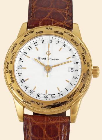 Girard-Perregaux, GP 90.World Time, No. 0J-25.Ref. 1010. Produced in.the 1990s..Fine, center-seconds, self-winding.two time zone, water-resistant, 18K.yellow gold gentleman's wristwatch.with date and an 18K yellow gold.buckle. Accompanied by an original.f