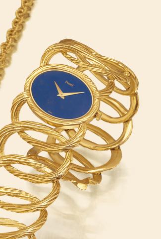 Yellow Gold & Lapis Lazuli Bracelet Watch.Piaget, No. 197530, Ref. 9852D65. Made circa 1980..Very fine and elegant, 18K yellow gold lady