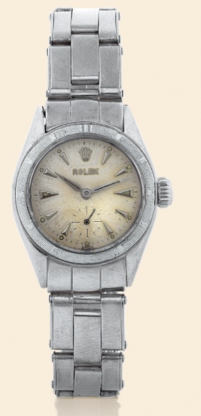 Rolex, Oyster Perpetual.Ref. 6505. Made in 1954..Fine and rare, self-winding.water-resistant, stainless steel.lady's wristwatch with a stainless steel.Rolex Oyster expansion bracelet..To be sold without reserve
