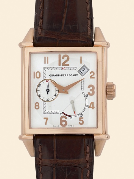 Vintage Power Reserve.Girard-Perregaux, Vintage Power.Reserve, Automatic, No. 131, Ref..2585. Made circa 2000..Fine, rectangular curved, self-winding, water-resistant.18K pink gold gentleman's wristwatch with 45-hour.power reserve indicator, date and 18K 