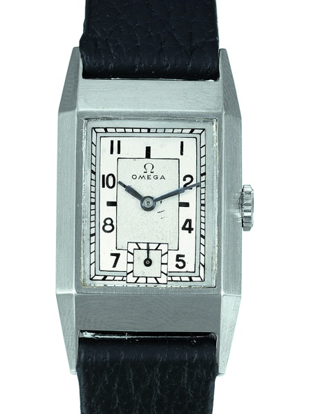 STAYBRITE REF. 958.Omega, No. 8262280, case No. 90388956, Ref. CK 958..Sold on January 16, 1937..Very fine and rare, rectangular, dustproof, Staybrite.gentleman