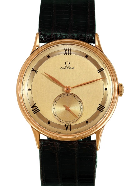 PINK GOLD.Omega, No. 9894215, case No. 10503631, Ref. OT 2259. Made in 1944..Fine and elegant, 18K pink gold gentleman`s wristwatch with two-tone gilt dial and a.gold-plated Omega buckle. This watch is sold with box, Certificate of Authenticity and.a 2-ye