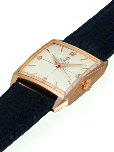 CREAM DIAL.Omega, Automatic, No. 16408612, Ref. OT 3985. Sold on.May 23, 1961..Very fine, square, center seconds, self-winding, anti-magnetic.18K pink gold wristwatch with a pink gold Omega buckle. This watch is sold.with a box, Certificate of Authenticit
